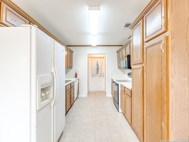 kitchen featuring a textured ceiling, light tile patterned floors, black appliances, and ornamental molding