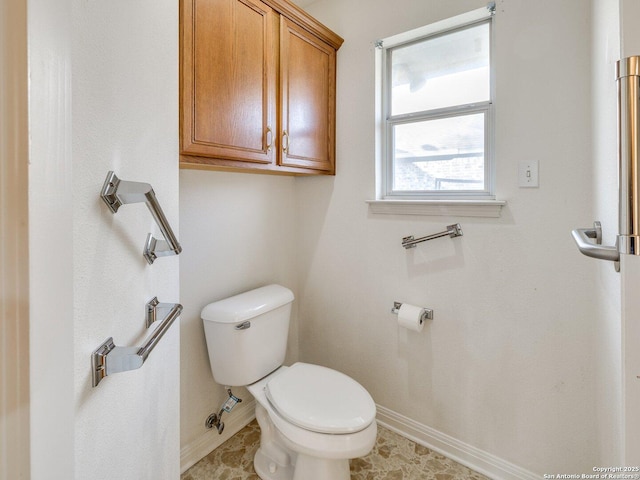 bathroom featuring toilet