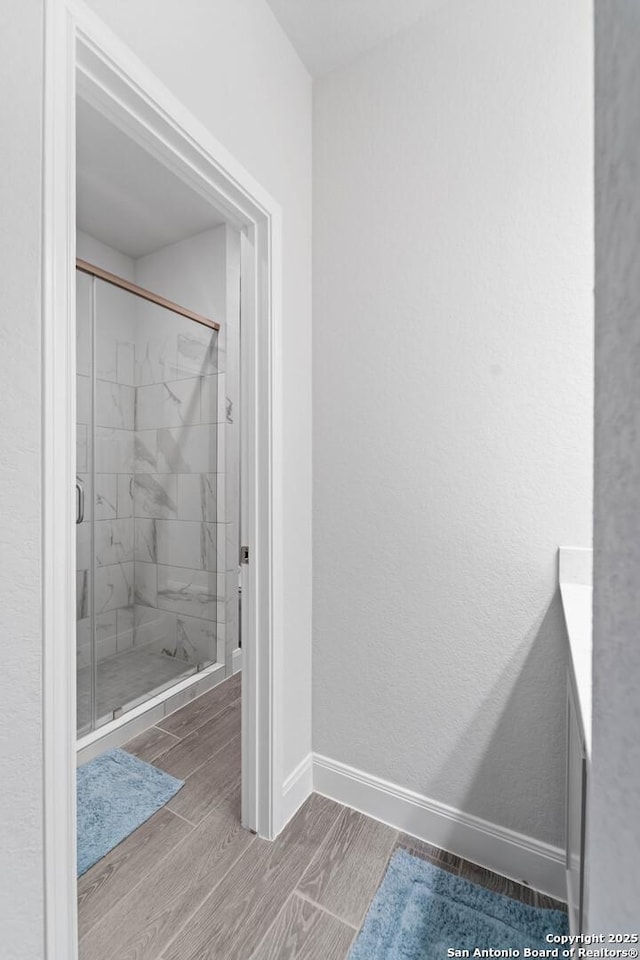 bathroom with an enclosed shower