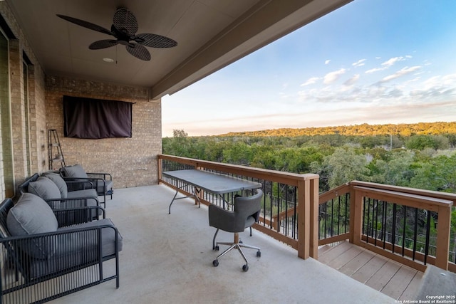 balcony at dusk with ceiling fan