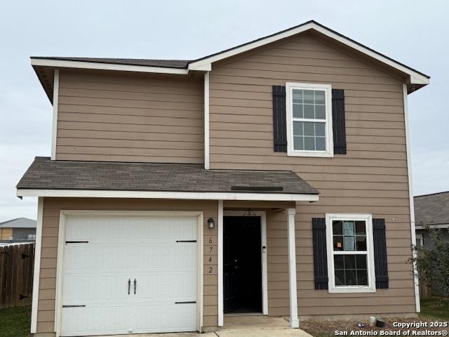 view of front of home featuring a garage