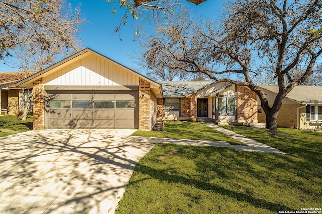 ranch-style home featuring a front lawn and a garage