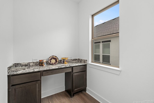 bathroom with hardwood / wood-style floors