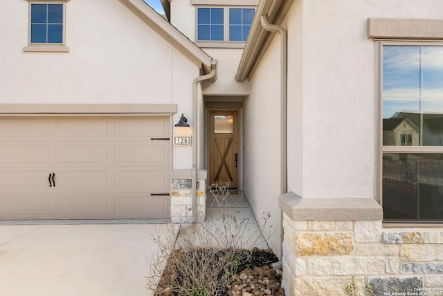 entrance to property with a garage