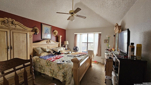 bedroom with a textured ceiling, lofted ceiling, carpet, and ceiling fan