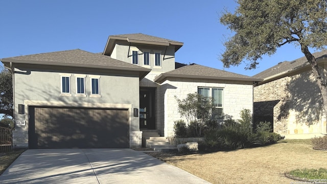 view of front of home with a garage