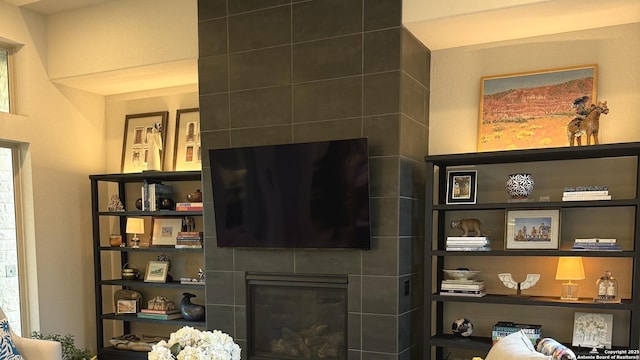 living room featuring a fireplace