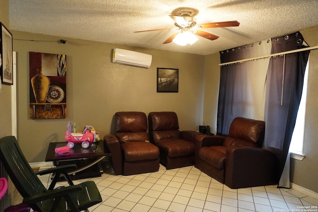 tiled living room featuring ceiling fan, a textured ceiling, and a wall unit AC