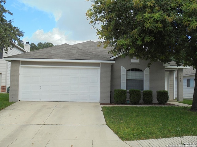 ranch-style house with a front lawn and a garage