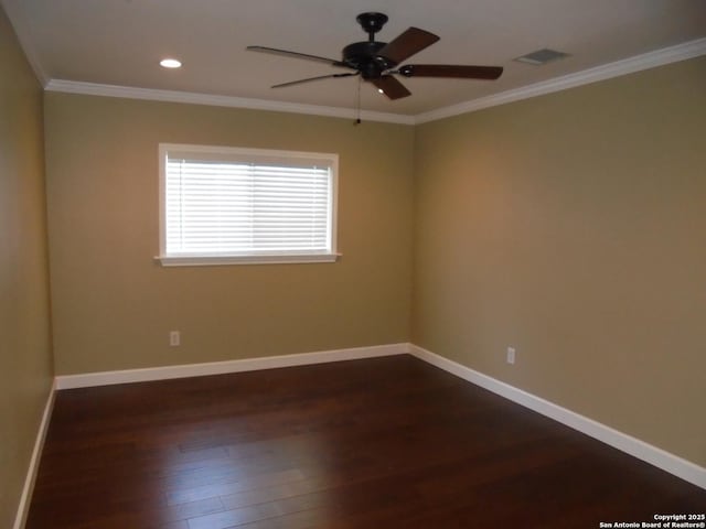 unfurnished room featuring crown molding, dark hardwood / wood-style floors, and ceiling fan