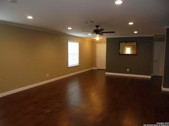 unfurnished room featuring crown molding, dark wood-type flooring, and ceiling fan