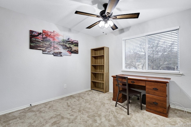 office with ceiling fan and light colored carpet