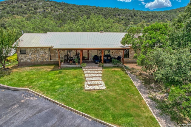 exterior space featuring a yard