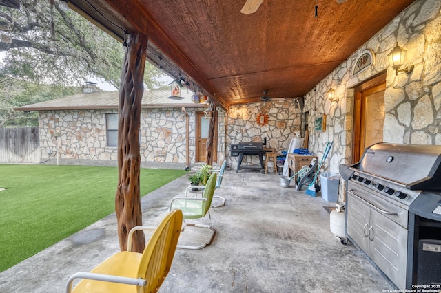 view of patio / terrace featuring ceiling fan and grilling area