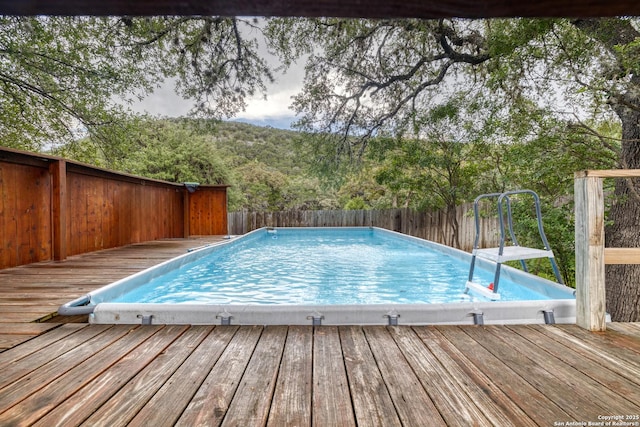 view of pool with a deck