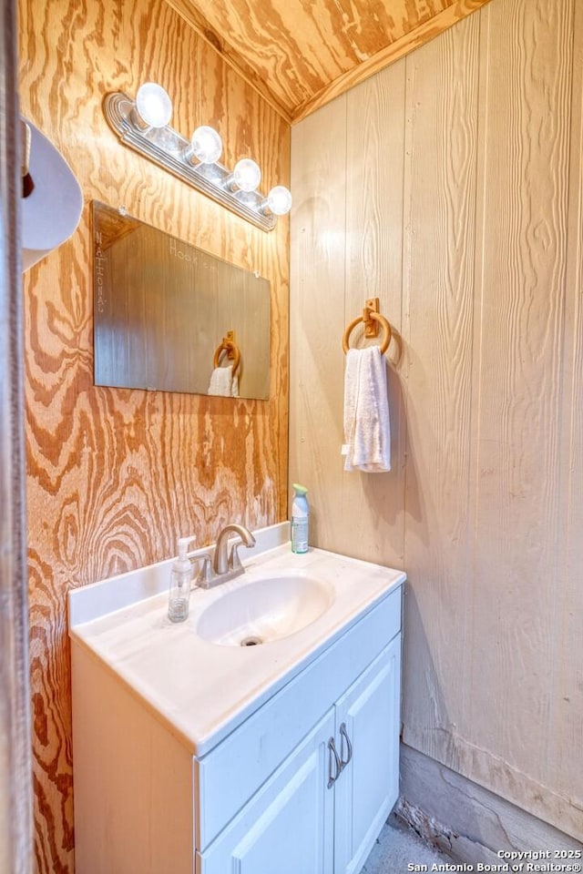 bathroom with vanity and wooden ceiling