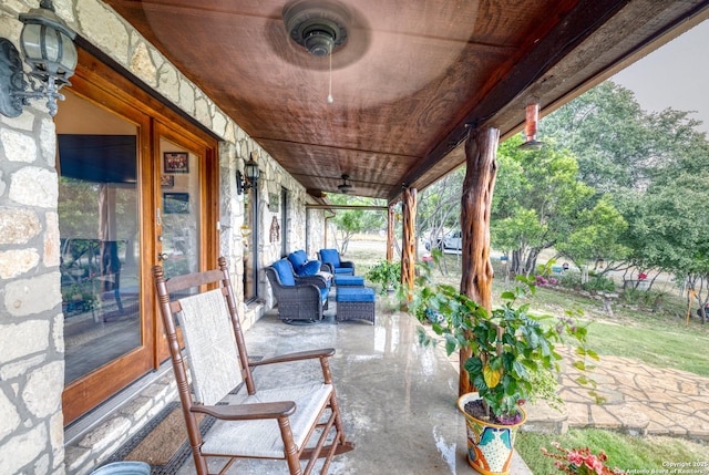 view of patio / terrace featuring ceiling fan and outdoor lounge area