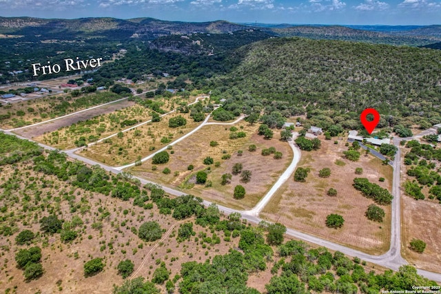 bird's eye view with a mountain view