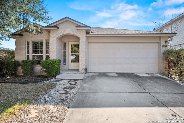 single story home with a garage