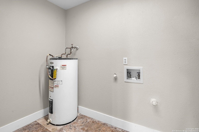 utility room featuring electric water heater