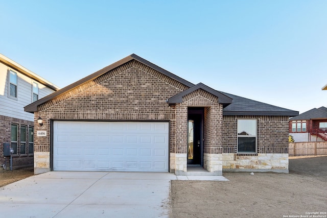 view of front of home with a garage