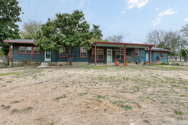 single story home with covered porch