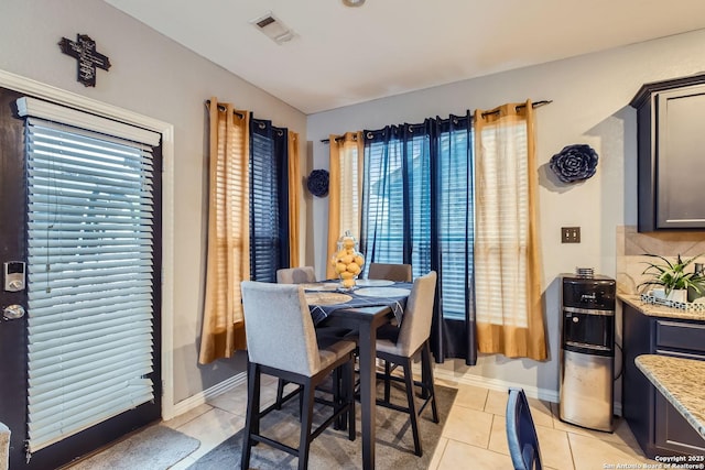 dining room featuring light tile patterned floors