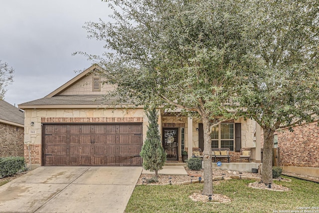 view of front of home with a garage and a front yard