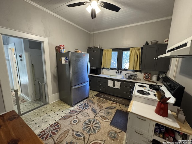 kitchen with electric range oven, sink, stainless steel fridge, ornamental molding, and range hood