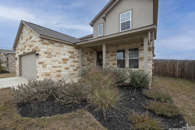 view of front of home with a garage