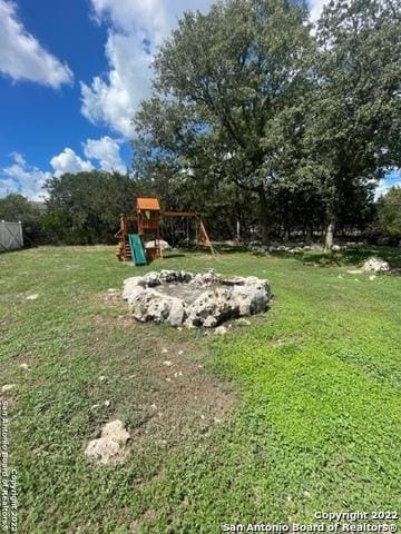 view of yard with a playground