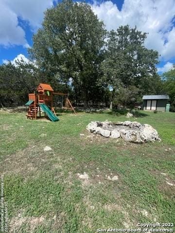 view of yard featuring a playground