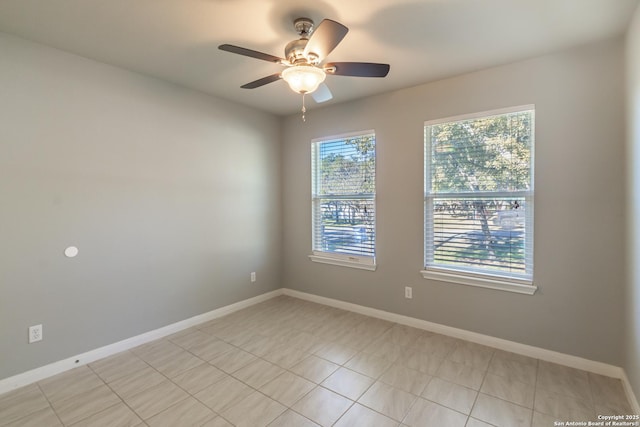 unfurnished room with ceiling fan