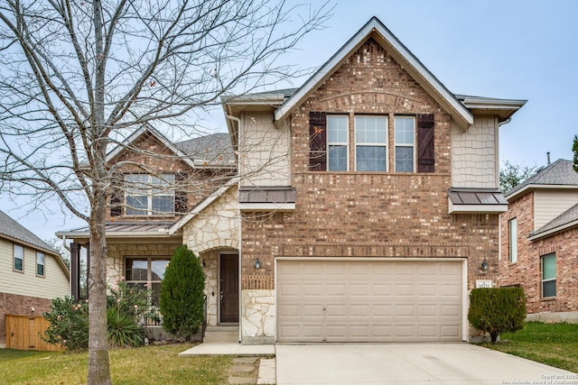 view of front of property featuring a garage