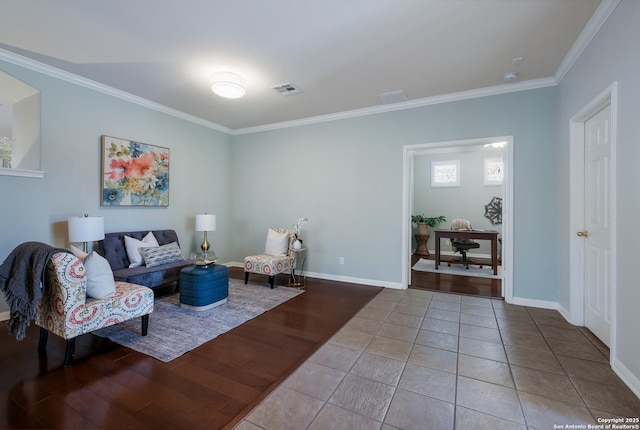 tiled living room with ornamental molding