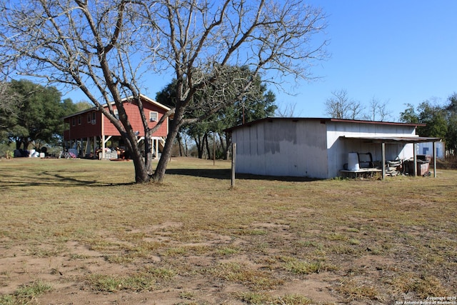 view of yard featuring a carport