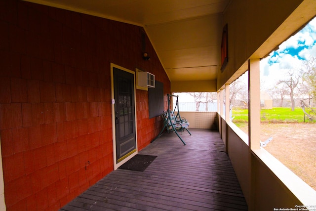 deck with an AC wall unit