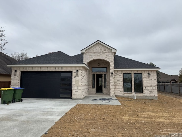 view of front of property featuring a garage