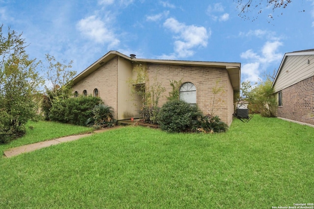 exterior space with a front yard