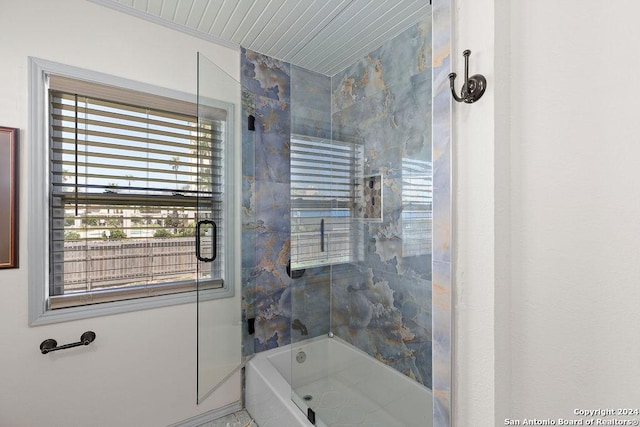 bathroom featuring tiled shower / bath combo