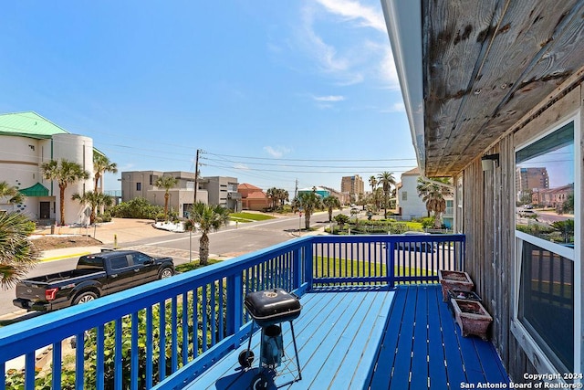 wooden deck with area for grilling