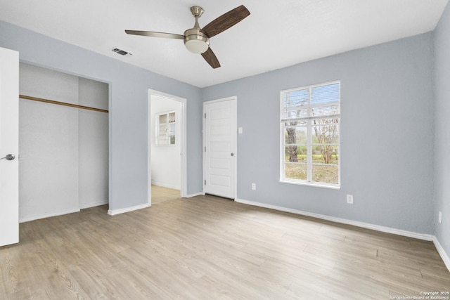 unfurnished bedroom featuring ceiling fan and light hardwood / wood-style flooring