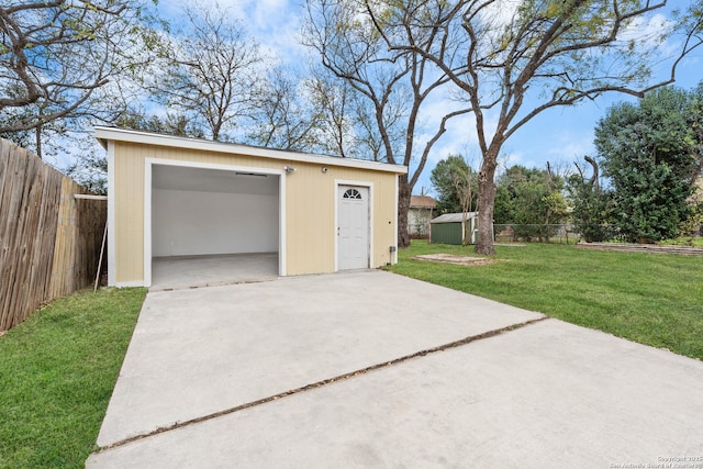 garage with a yard