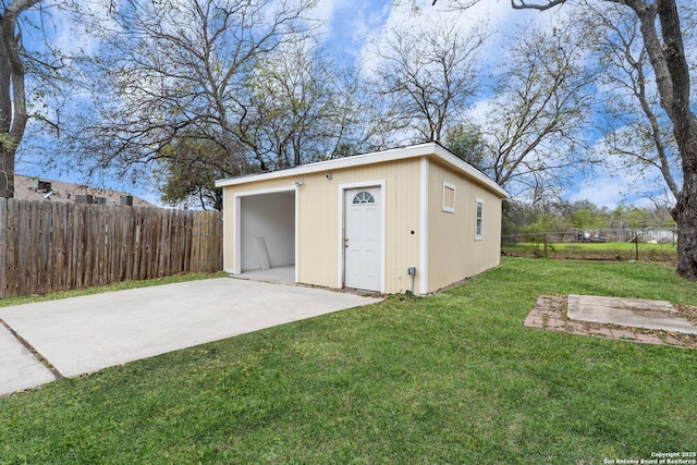 view of outdoor structure with a lawn