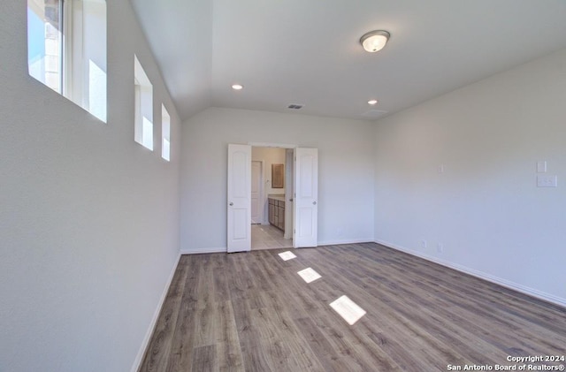 empty room featuring light hardwood / wood-style floors and a wealth of natural light