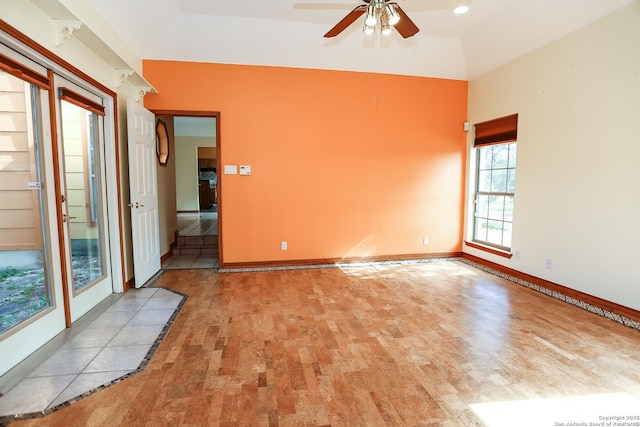 empty room with ceiling fan and light wood-type flooring