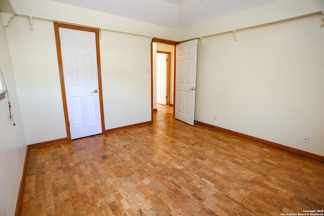 unfurnished bedroom featuring wood-type flooring