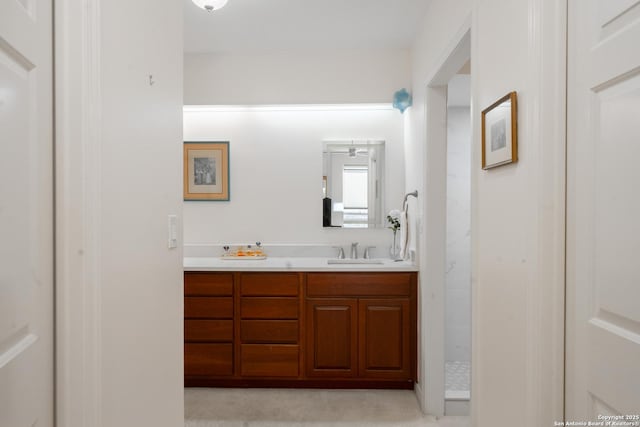 bathroom with vanity and walk in shower