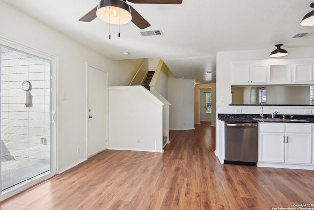 kitchen with wood-type flooring, dishwasher, white cabinetry, sink, and ceiling fan