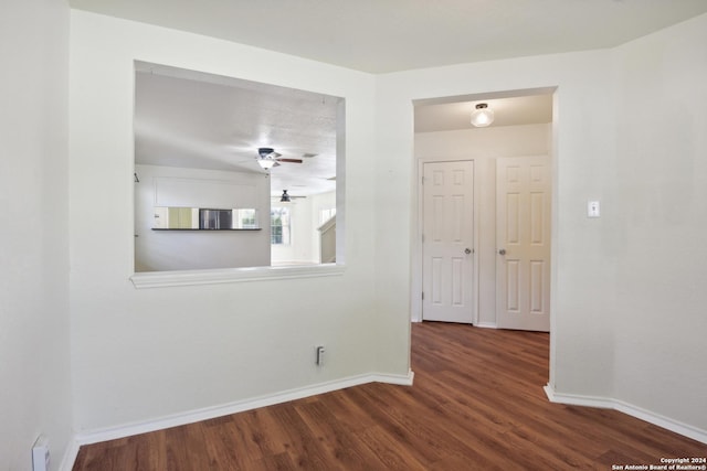 unfurnished room featuring hardwood / wood-style flooring and ceiling fan